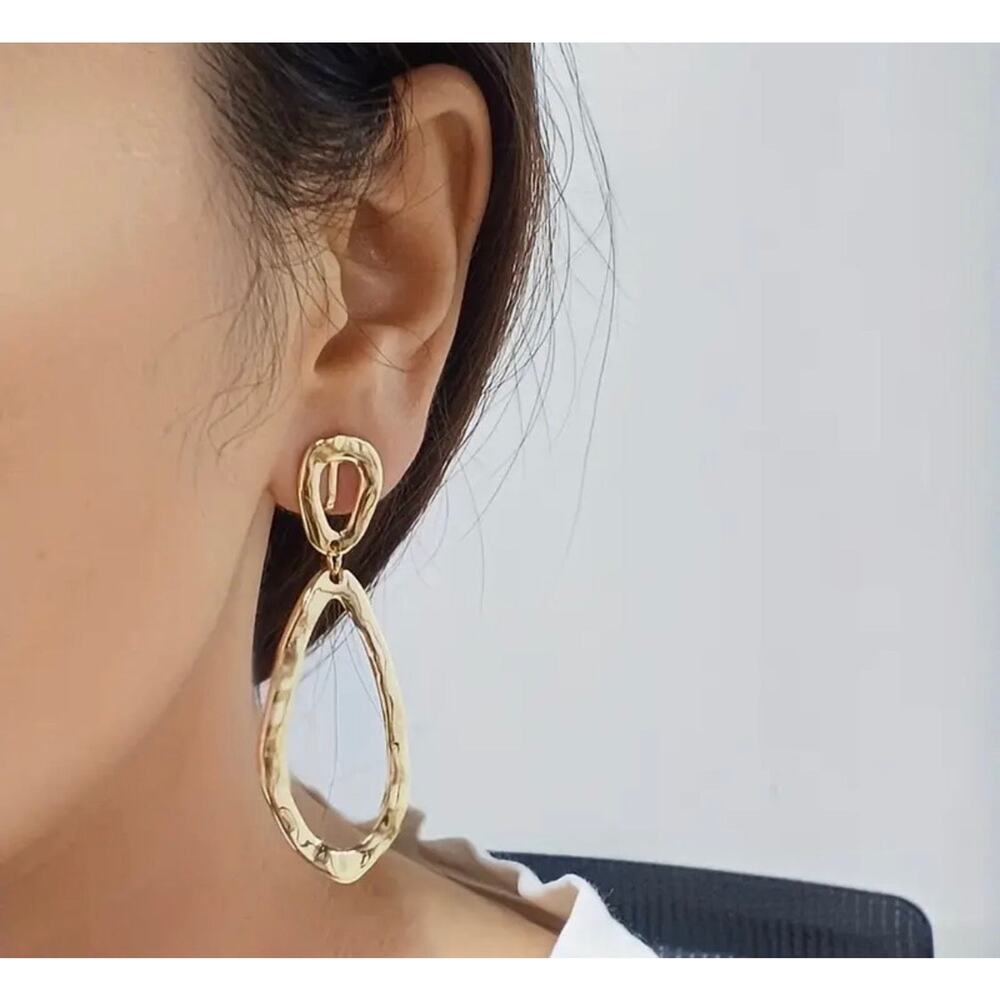 Clip on 2 1/2" gold hammered odd shaped dangle earrings